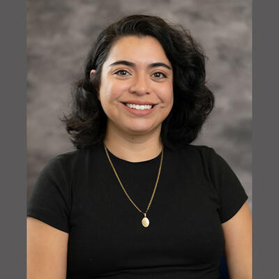 This is a portrait of Andi Pacheco's professional headshot. 
